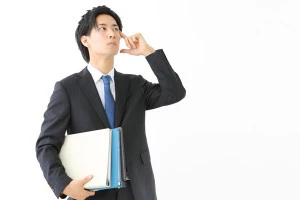 疑問に思うビジネスマン